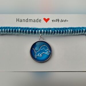 Blue and White Handmade Bracelet with Lion Charm